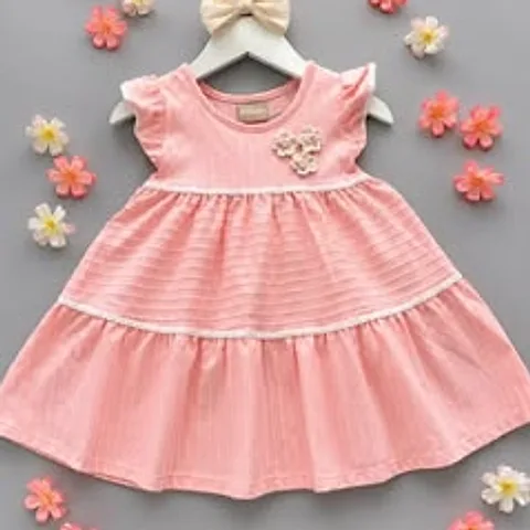 Vestido rosa de babados
